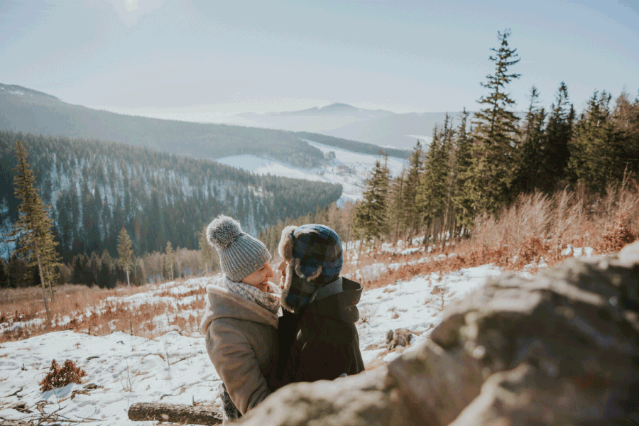 winter mountain sun couple portrait
